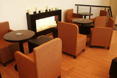 Darboven Coffee Shop - Lounge in Lipsia - Conversazione al caminetto